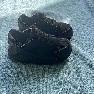 Black Nike sneakers for kids